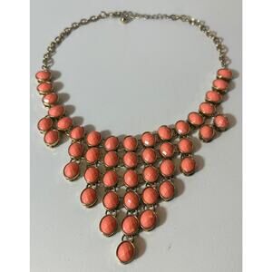 Bold Coral Statement Bib Necklace with Gold-Tone Metal Setting